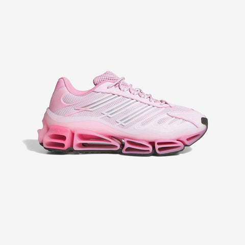 Pink low-top running shoe with mesh upper, three stripes, and segmented pink cushioned sole, shown from the side on a white background.