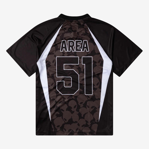 Back view of a black short-sleeve jersey with white side panels, a dark alien-head pattern, and the text AREA above the number 51 in white outline.