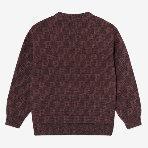 Back view of a brown knit crew-neck sweater with a dark all-over pattern of repeated small letter motifs.