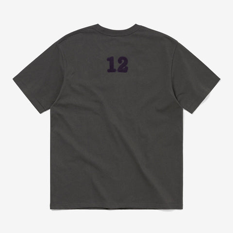 Back view of a charcoal grey short-sleeve t-shirt with a large dark purple number 12 printed across the upper back.